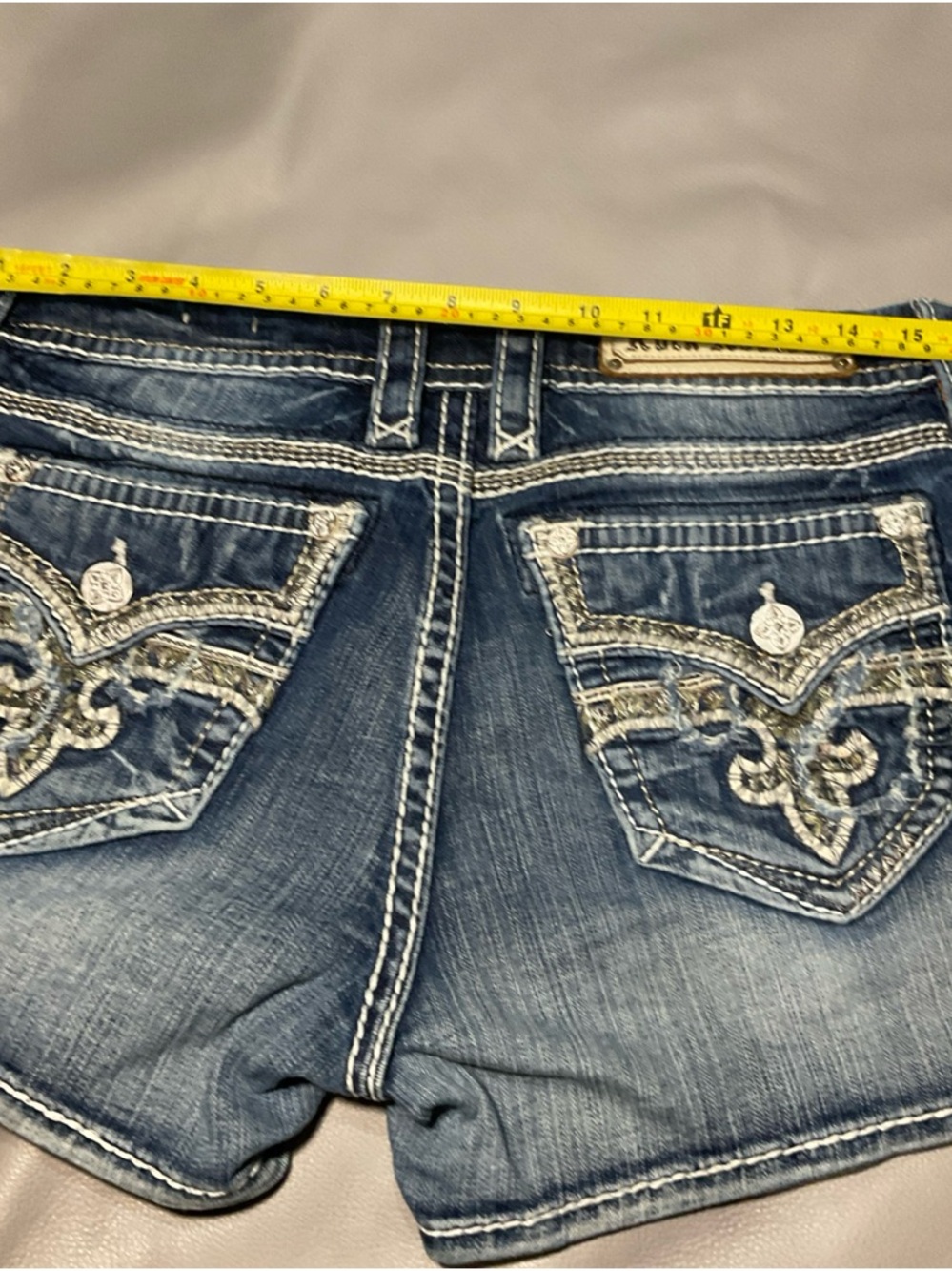 Rock Revival Women's Distressed Blue Jean Shorts with Embroidered Pockets - Picture 8 of 10